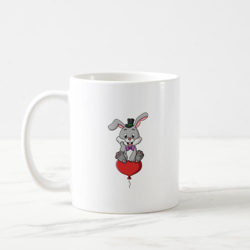 the happy rabbit is sitting on the flying love bal coffee mug