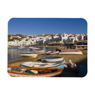 The harbor town with colorful fishing boats magnet