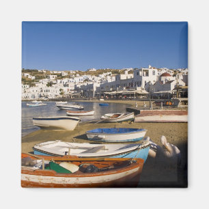 The harbor town with colorful fishing boats magnet