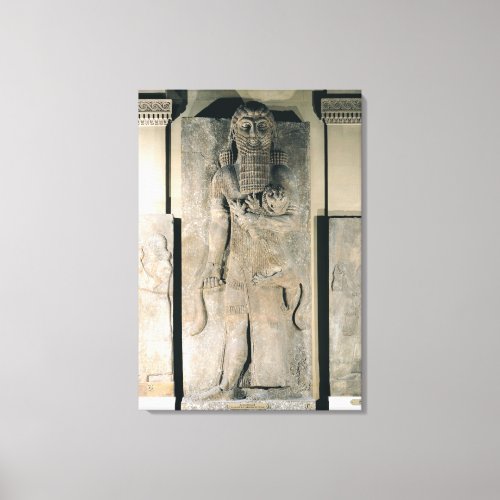 The hero Gilgamesh holding a lion Canvas Print