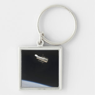 The Hubble Space Telescope in orbit above Earth 2 Keychain