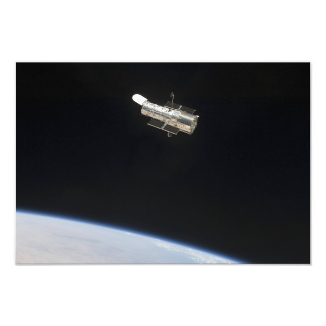 The Hubble Space Telescope in orbit above Earth 2 Photo Print (Front)