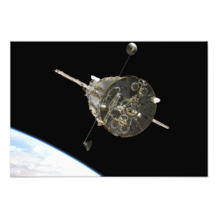 The Hubble Space Telescope in orbit above Earth Photo Print