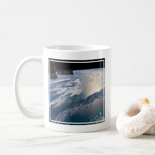 The International Spce Station Above The Atlantic Coffee Mug