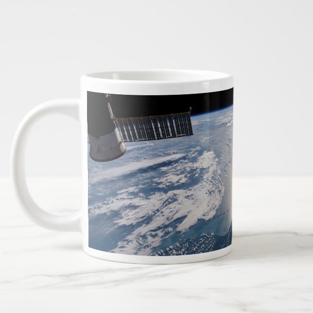 The International Spce Station Above The Atlantic Giant Coffee Mug (Left)