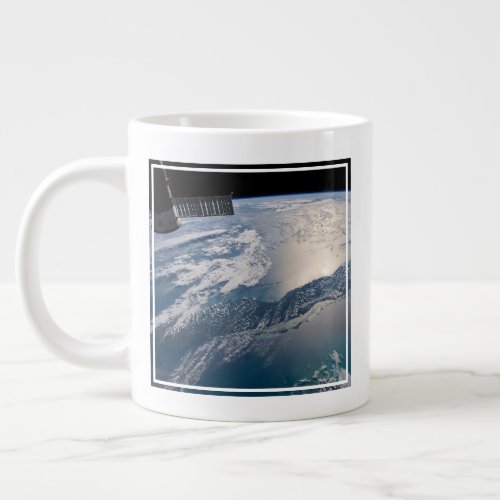 The International Spce Station Above The Atlantic Giant Coffee Mug