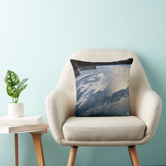 The International Spce Station Above The Atlantic Throw Pillow (Chair)