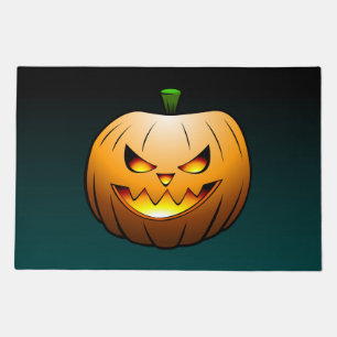 The Jack O'lantern is lit and burning brightly Doormat