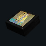 The Kiss by Gustav Klimt, Vintage Art Nouveau Keepsake Box<br><div class="desc">The Kiss (Der Kuss) (1907/08) by Gustav Klimt is probably his most famous work. Klimt began work on it in 1907 and it is the highpoint of his so-called 'Golden Period'. The Kiss is a vintage Victorian Era Symbolism fine art love and romance painting featuring a romantic couple in various...</div>