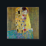 The Kiss by Gustav Klimt, Vintage Art Nouveau Pinback Button<br><div class="desc">The Kiss (Der Kuss) (1907/08) by Gustav Klimt is probably his most famous work. Klimt began work on it in 1907 and it is the highpoint of his so-called 'Golden Period'. The Kiss is a vintage Victorian Era Symbolism fine art love and romance painting featuring a romantic couple in various...</div>