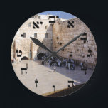 The Kotel - Hebrew Block Lettering Round Clock<br><div class="desc">The "Hebrew Essentials, " Consumer Marketplace offers a shopping experience as you will not find anywhere else. Our specialty is Hebrew,  and in our store your will find Hebrew in block,  script,  and Rashi script.  Tell your friends about us and send them our link:  http://www.zazzle.com/HebrewNames?rf=238549869542096443*  ENJOY YOUR VISIT!</div>