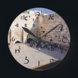 The Kotel - Hebrew Script Lettering Round Clock<br><div class="desc">The "Hebrew Essentials, " Consumer Marketplace offers a shopping experience as you will not find anywhere else. Our specialty is Hebrew,  and in our store your will find Hebrew in block,  script,  and Rashi script.  Tell your friends about us and send them our link:  http://www.zazzle.com/HebrewNames?rf=238549869542096443*  ENJOY YOUR VISIT!</div>