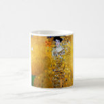 The Lady in Gold, Gustav Klimt Coffee Mug<br><div class="desc">Gustav Klimt (July 14, 1862 – February 6, 1918) was an Austrian symbolist painter and one of the most prominent members of the Vienna Secession movement. Klimt is noted for his paintings, murals, sketches, and other objets d'art. Klimt's primary subject was the female body, and his works are marked by...</div>