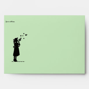 the little girl blowing soap bubbles envelope