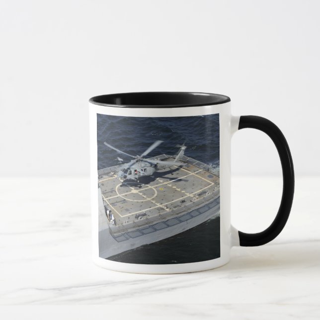 The littoral combat ship USS Freedom Mug (Right)