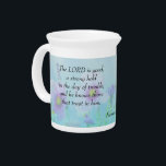 The Lord Is Good - Nahum 1:7  Beverage Pitcher<br><div class="desc">"The LORD is good,  a strong hold in the day of trouble; and he knows those that trust in him." Nahum 1:7.  Make this beautiful declaration of faith with this scripture text on a soft blue,  pink and purple pastel floral background.</div>