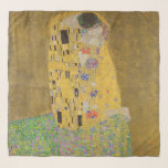 The Lovers Kissing Embrace by Gustav Klimt Scarf<br><div class="desc">Sunlight glints off the swirling golden embrace that surrounds the lovers in Gustav Klimt's masterpiece, The Kiss. The scene is a paradox of intimacy and isolation. The couple stands on a precipice, a field of colorful flowers at their feet, yet they are oblivious to the world around them. Their gazes...</div>