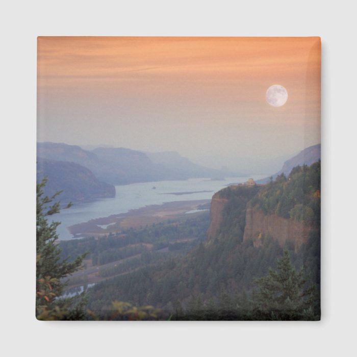 The moon hangs in the sky above the Vista Fridge Magnets