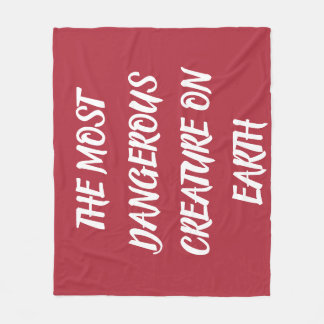 THE MOST DANGEROUS CREATURE ON EARTH  FLEECE BLANKET