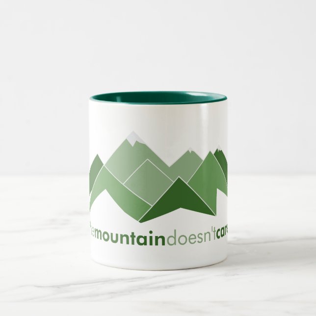 The Mountain Doesn't Care Two-Tone Coffee Mug (Center)