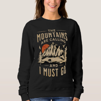 THE MOUNTAINS ARE CALLING AND I MUST GO SWEATSHIRT