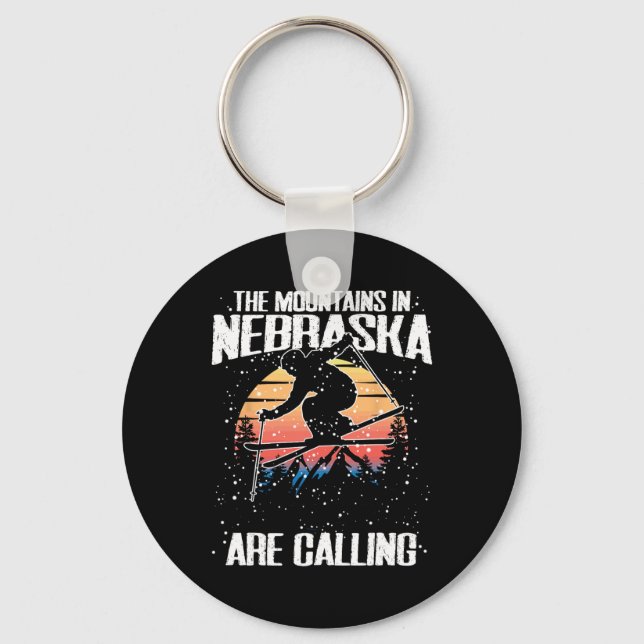 The Mountains In Nebraska Are Calling Funny Skiing Keychain (Front)