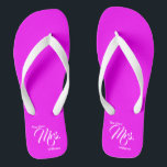 The New Mrs. Magenta and White Wedding Flip Flops<br><div class="desc">These wedding flip flops have a magenta footbed. In white script,  they say 'The New Mrs." and have a place to add the bride's new name.</div>