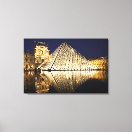The night view of the glass Pyramid of Musee du Canvas Print