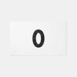 The number zero (0) in black outdoor rug