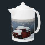 The Old Red Truck Teapot<br><div class="desc">A wintry,  rural scene featuring a snow-covered,  dilapidated,  old,  red truck sitting near a ramshackle cabin near Sandpoint,  ID.</div>