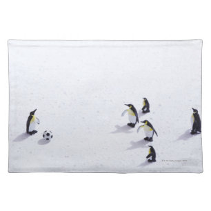 The penguins playing soccer placemat