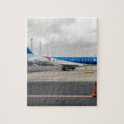 The plane at the airport jigsaw puzzle