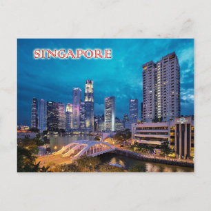 The quay and Singapore skyline at night Postcard
