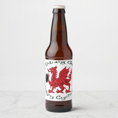 The Red Dragon Inspires Action Green Text Beer Bottle Label