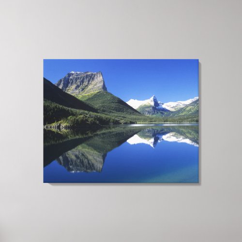 The Rocky Mountains reflected on Saint Mary Lake Canvas Print