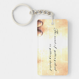 The Secret to Getting Ahead Keychain