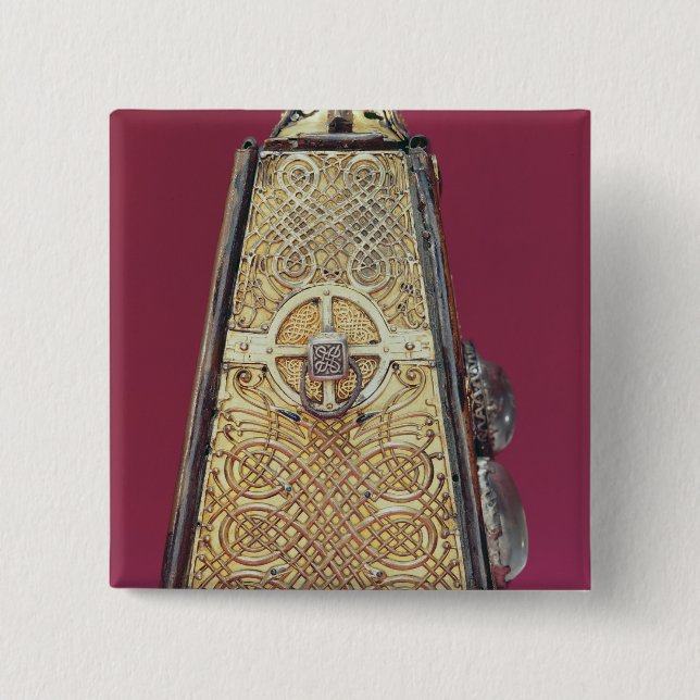 The silver side button (Front)