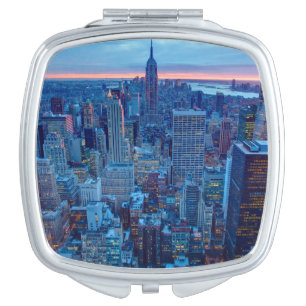 The skyscrapers of Manhattan are lit Compact Mirror