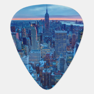 The skyscrapers of Manhattan are lit Guitar Pick