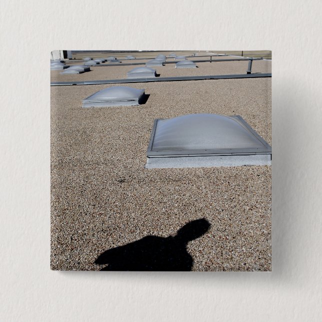The solar day lighting system pinback button (Front)