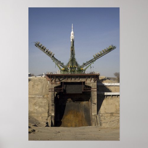 The Soyuz rocket is erected into position 2 Poster