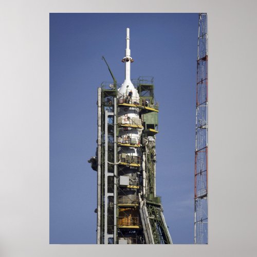 The Soyuz rocket is erected into position 3 Poster