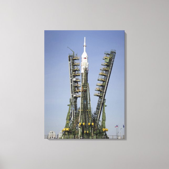The Soyuz rocket is erected into position 4 Canvas Print (Front)