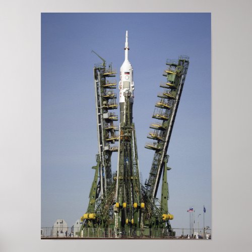 The Soyuz rocket is erected into position 4 Poster