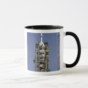 The Soyuz rocket is erected into position Mug