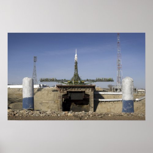 The Soyuz rocket is erected into position Poster