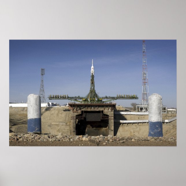 The Soyuz rocket is erected into position Poster (Front)