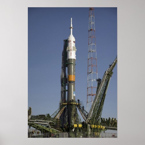 The Soyuz rocket is erected into position Poster