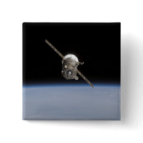 The Soyuz TMA-11 spacecraft above Earth's horiz Pinback Button