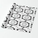 The Star of David - Wrapping Paper<br><div class="desc">The Jewish Holiday Hanukkah. This black and white design features the "Star of David". Stars surround the Star of David in an oval shape. The corners are decorated with leaves and the Star of David. This wrapping paper comes in assorted styles. Pick your favorite style and design.</div>